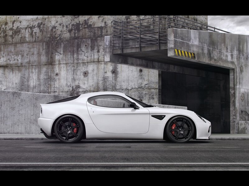 white sports car in urban setting