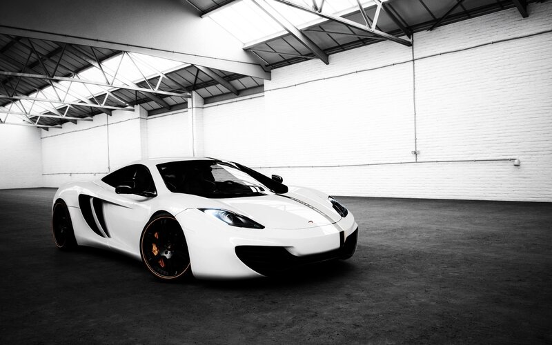 white sports car in warehouse