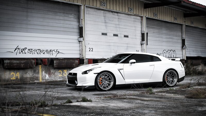 white sports car in warehouse