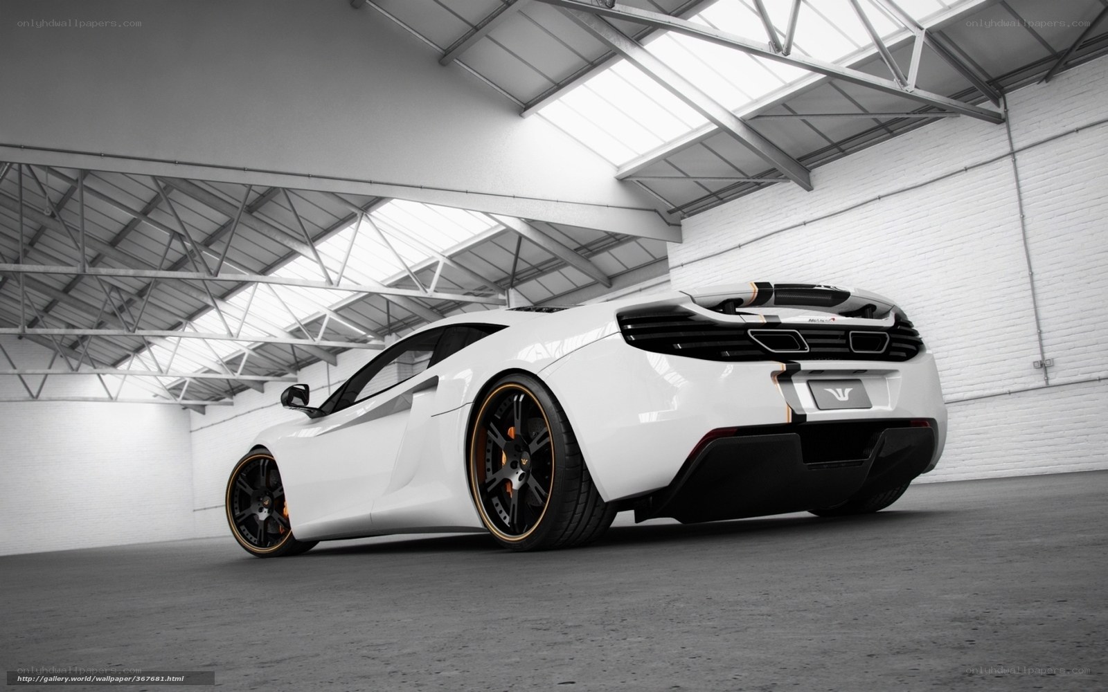 white sports car in warehouse