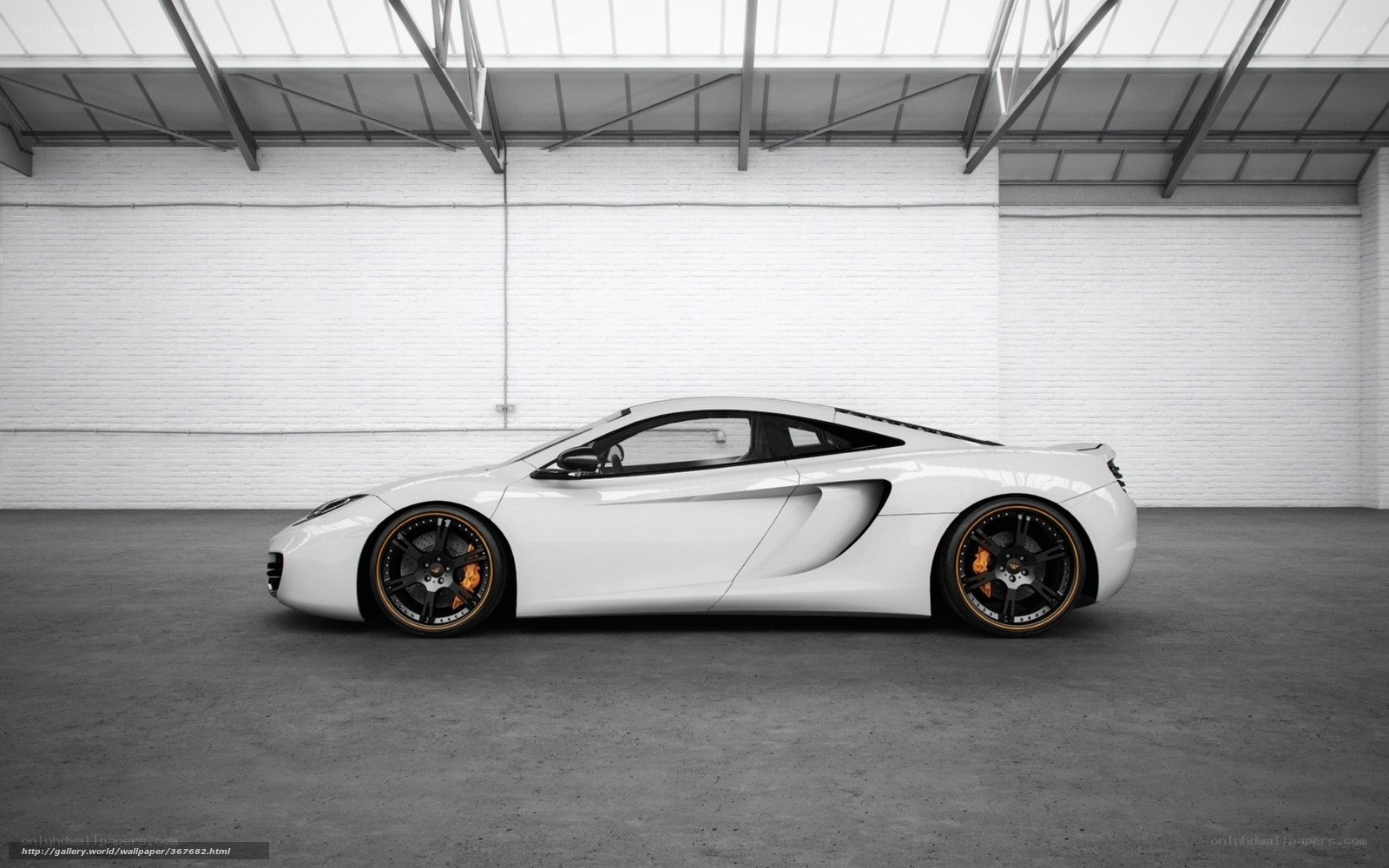 white sports car in warehouse