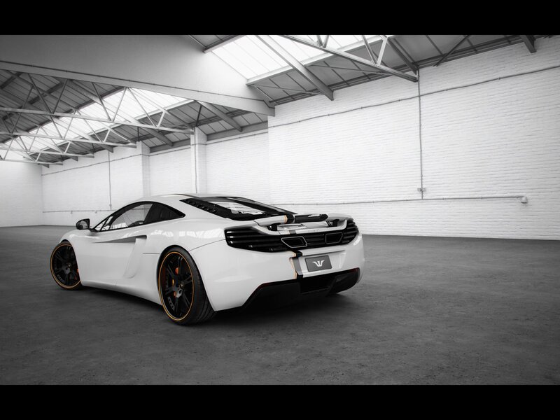 white sports car in warehouse