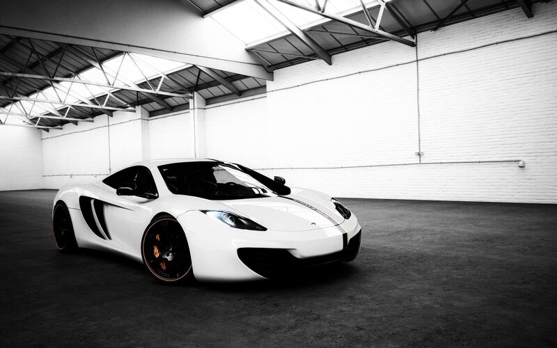 White sports car in warehouse