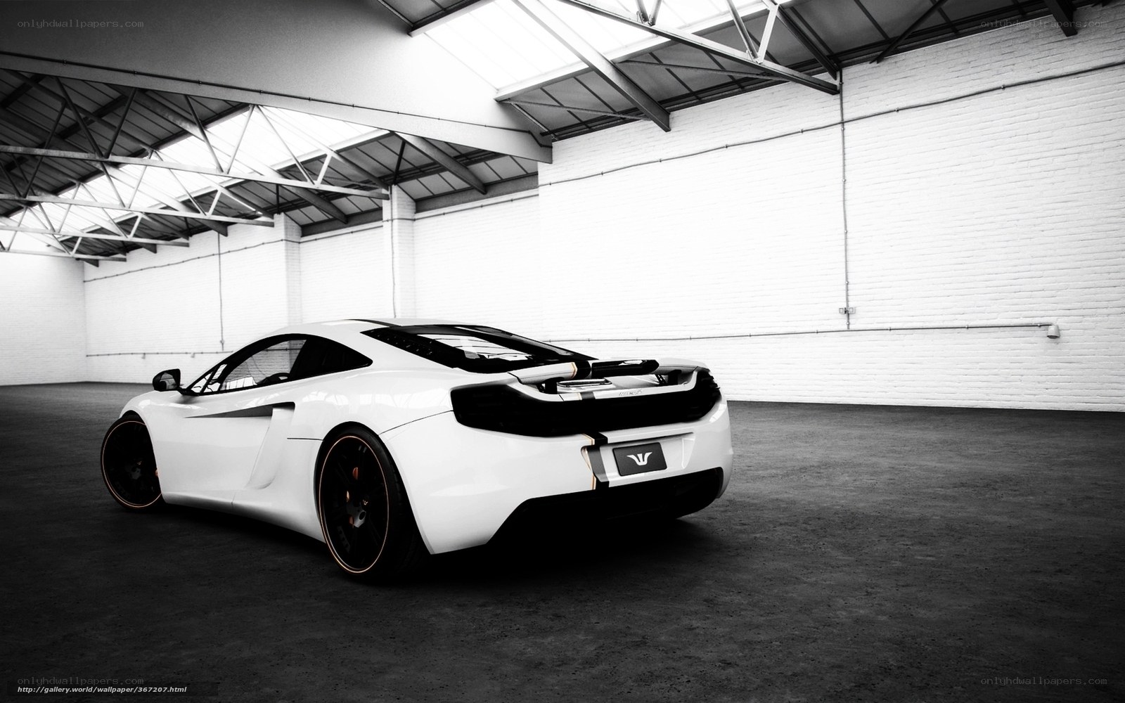 white sports car in warehouse