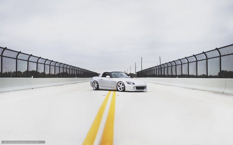 white sports car on a bridge