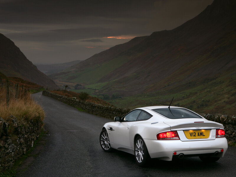 White sports car on a mountain road