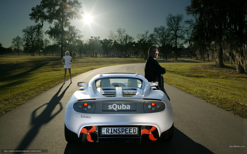 White sports car on a park road