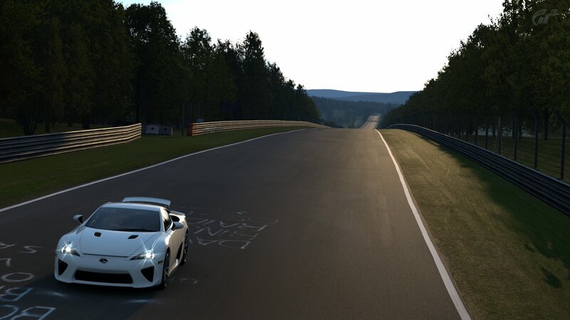 White sports car on a racetrack