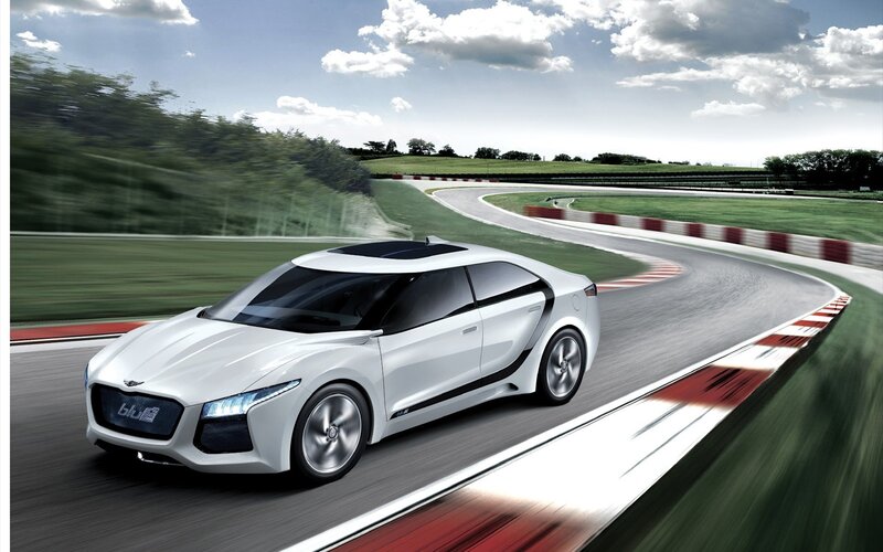 White sports car on a racetrack