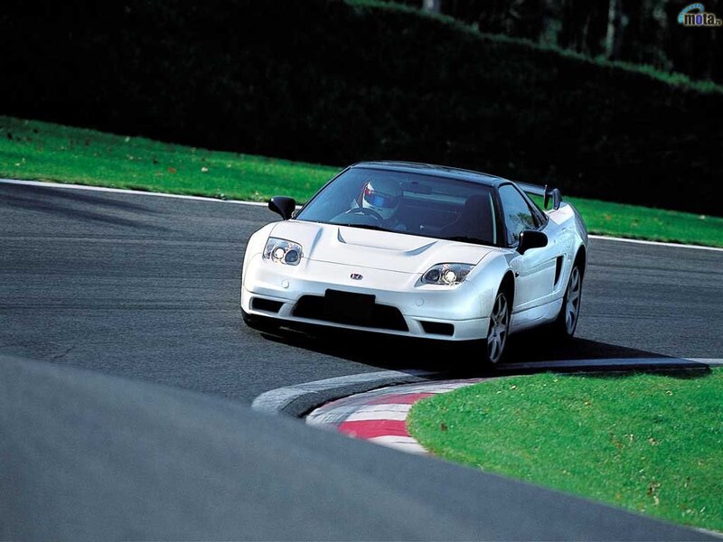 White sports car on a racetrack