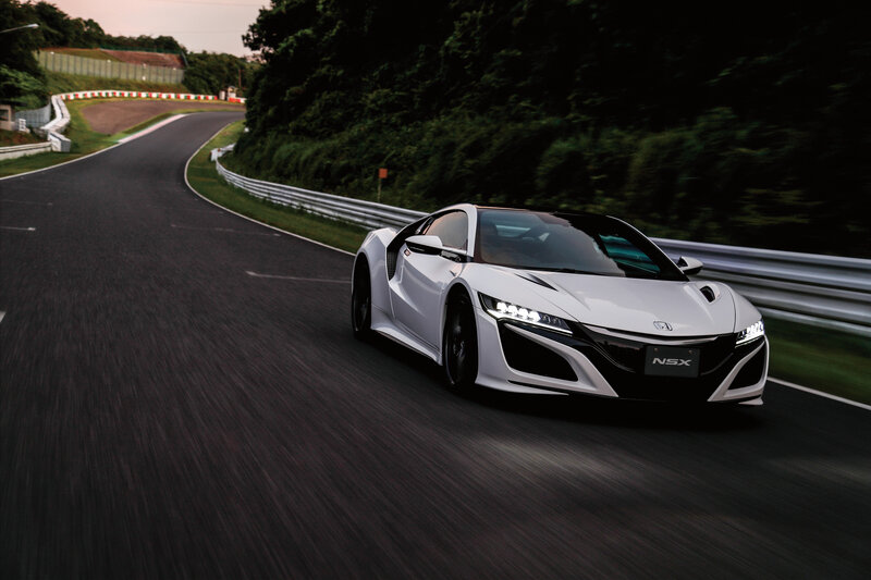 White sports car on a racetrack
