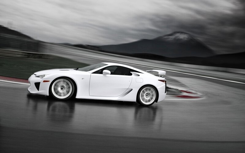 White sports car on a racetrack