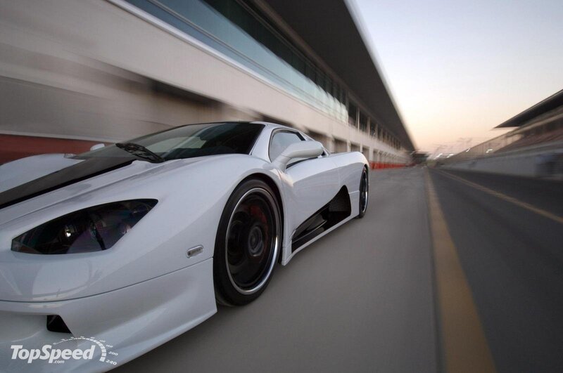 White sports car on a racetrack