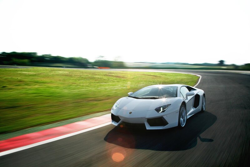 White sports car on a racetrack