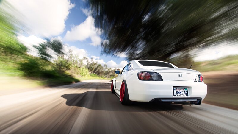 White sports car on a road