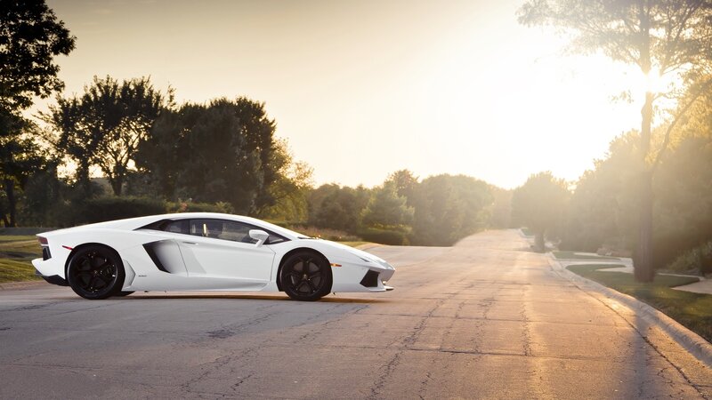 White sports car on a road