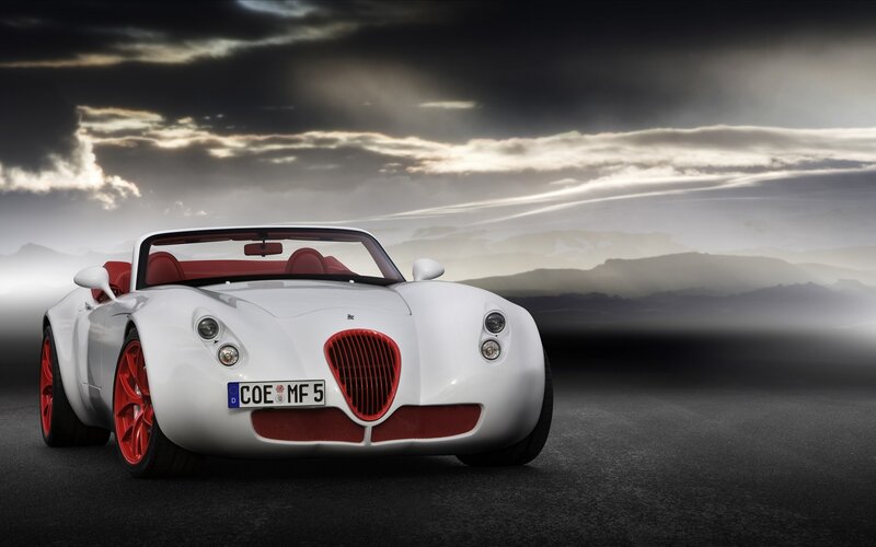 White sports car on a road