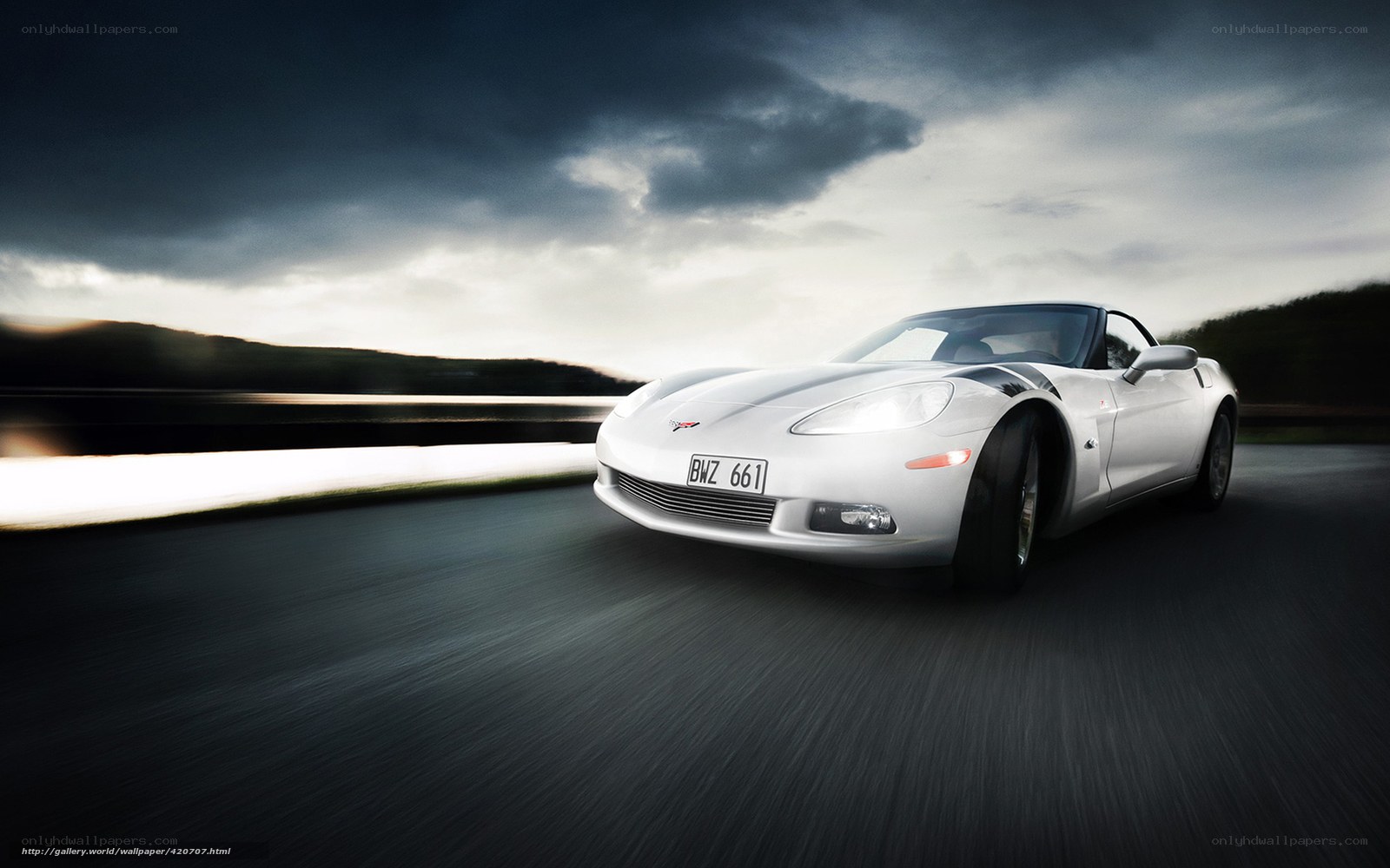 White sports car on a road