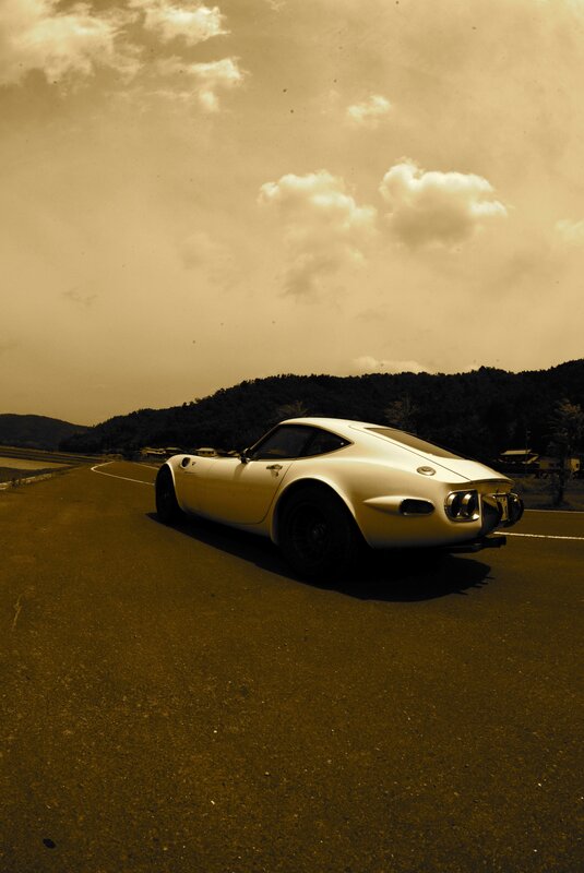 White sports car on a road