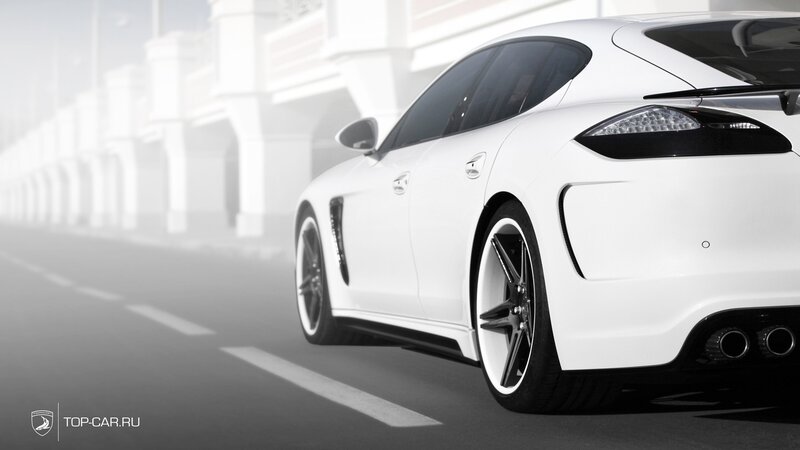 White sports car on a road