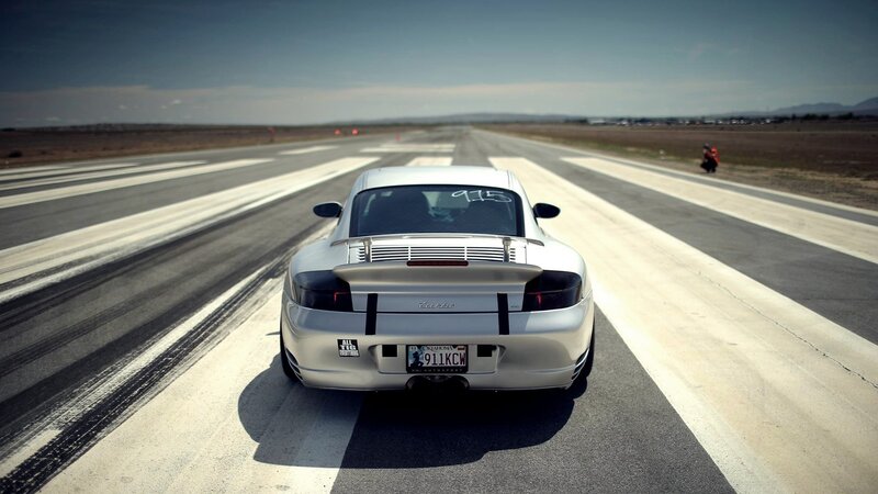 white sports car on a runway