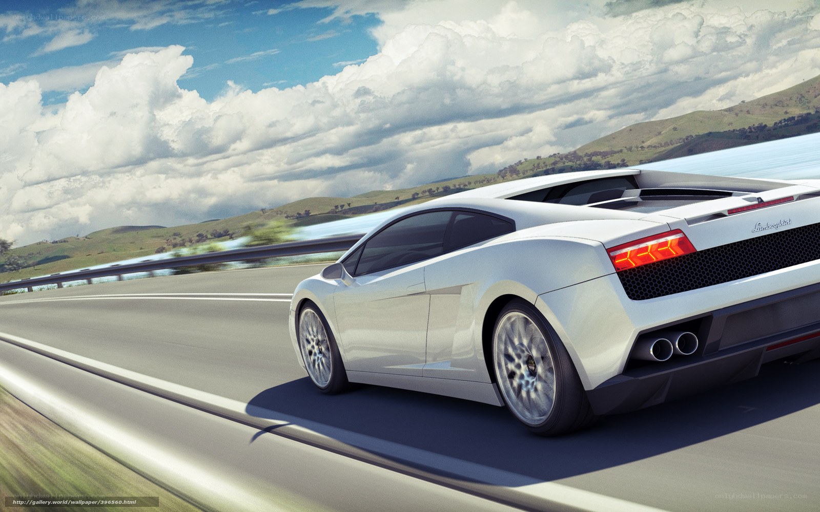 White sports car on a scenic road