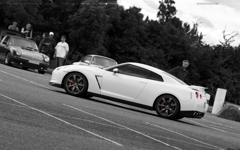 White sports car on a track