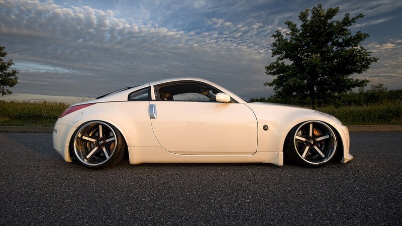 white sports car on asphalt