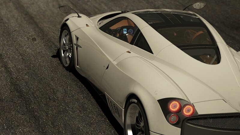 white sports car on asphalt