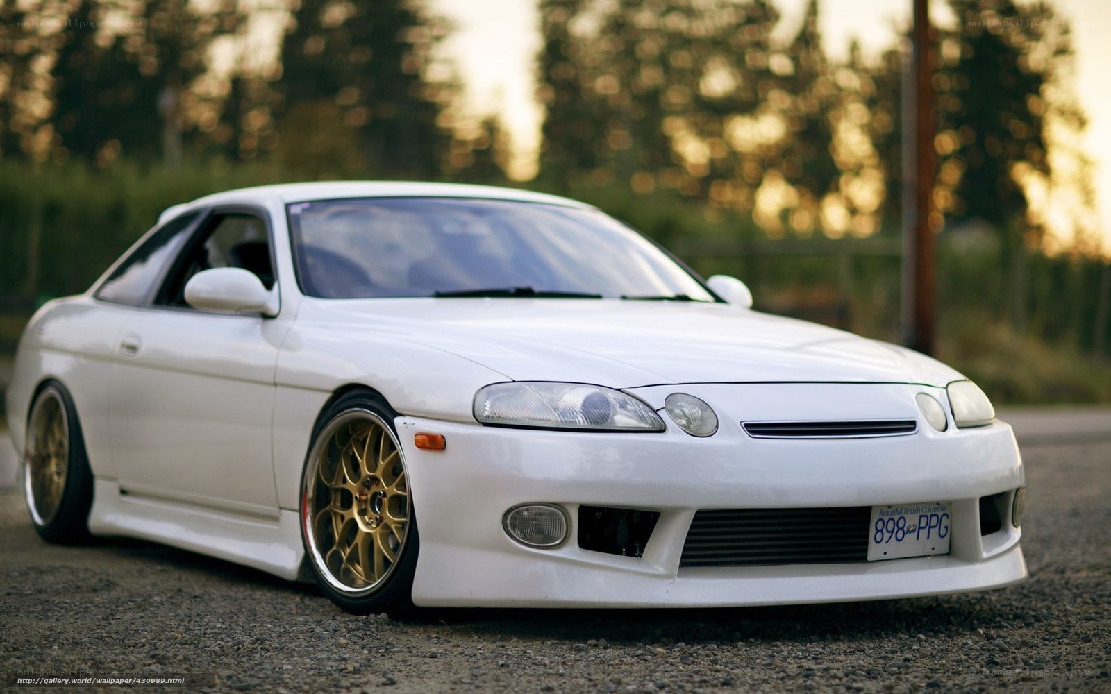 white sports car on asphalt