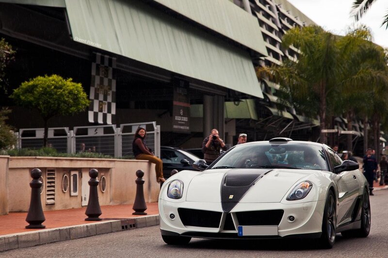 White sports car on city street