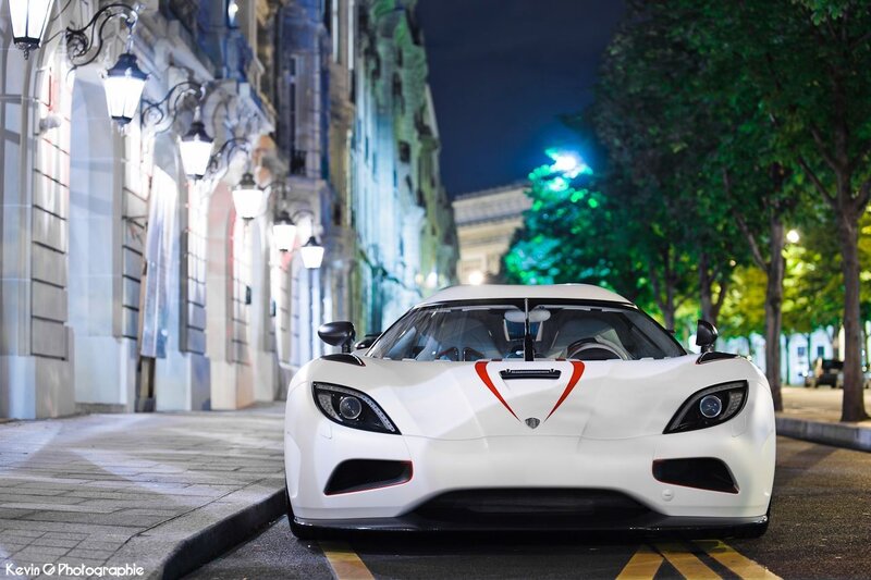 White sports car on city street