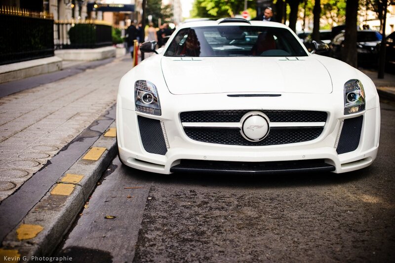 White sports car on city street