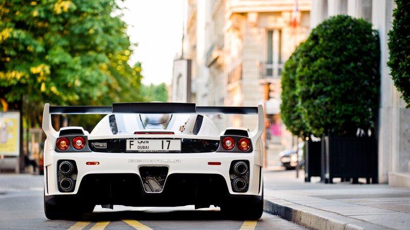 white sports car on city street