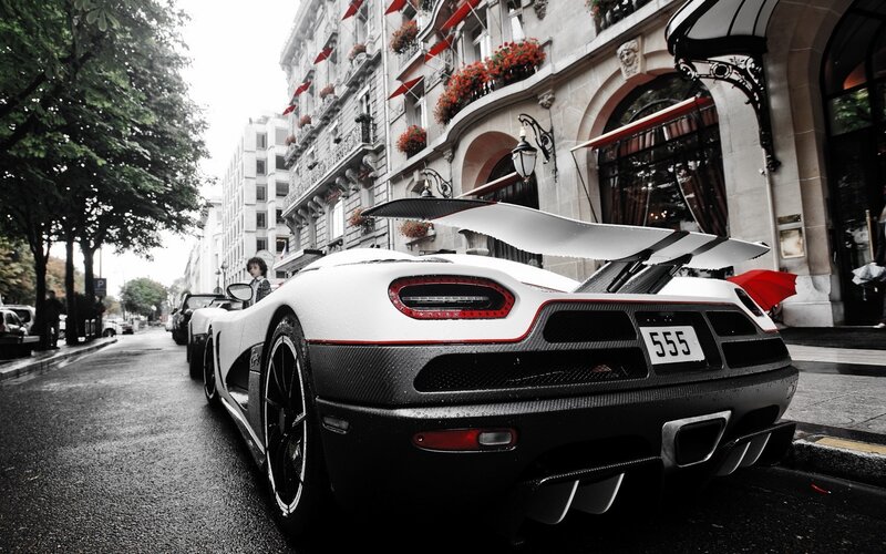 White sports car on city street