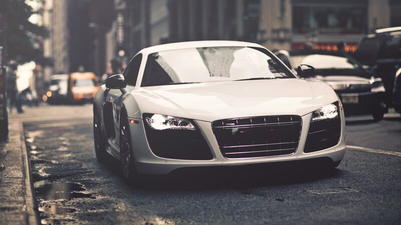 white sports car on city street
