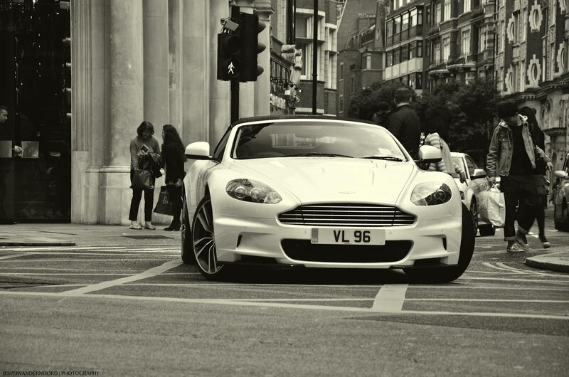 White sports car on city street