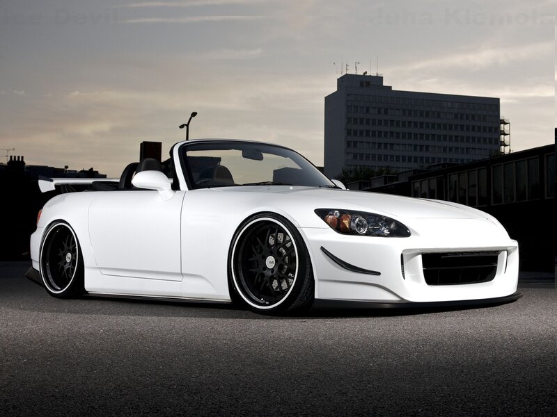 white sports car on city street