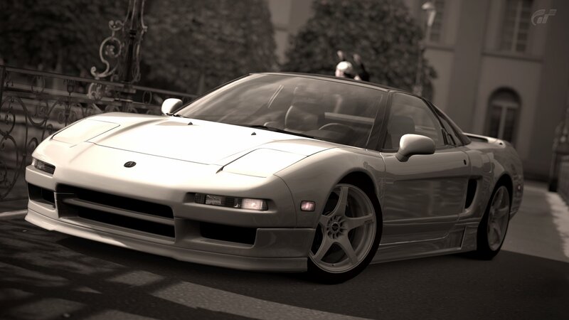 white sports car on city street