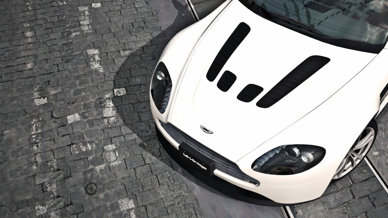 white sports car on cobblestone