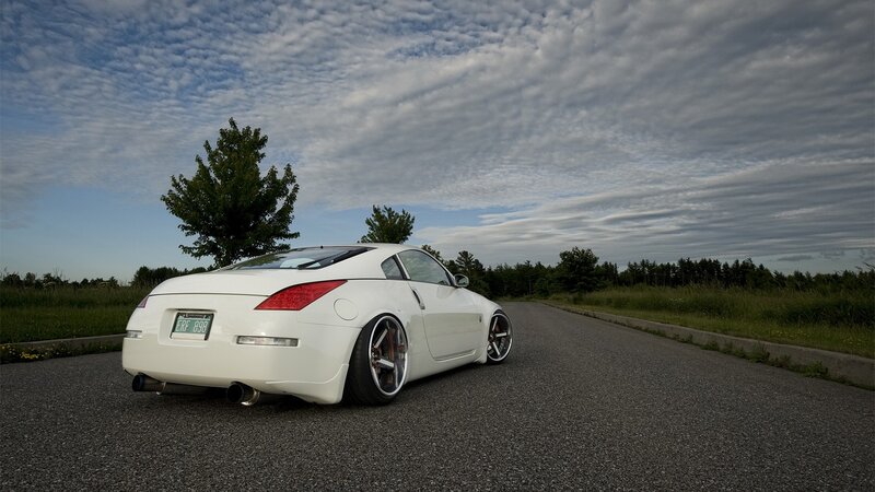 white sports car on country road