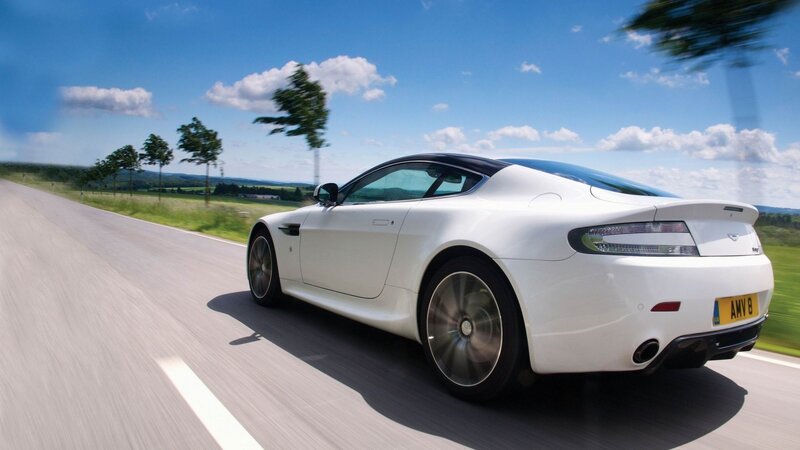 white sports car on country road