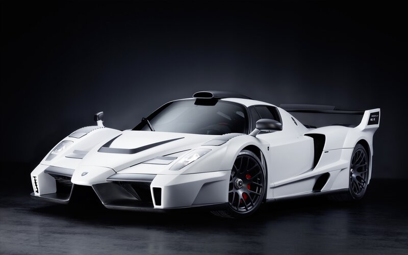 white sports car on dark background