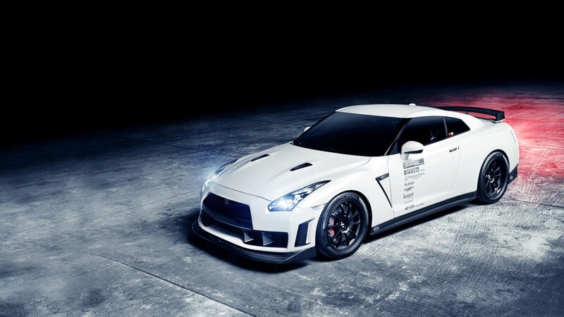 white sports car on dark background