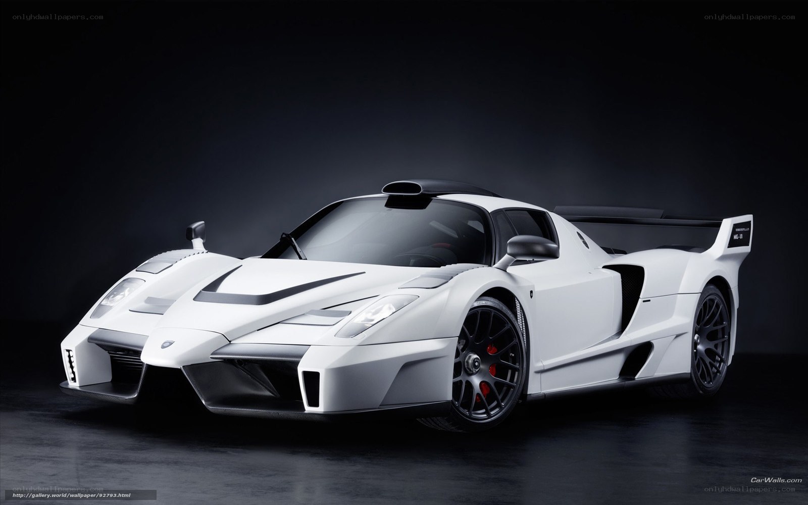 white sports car on dark background
