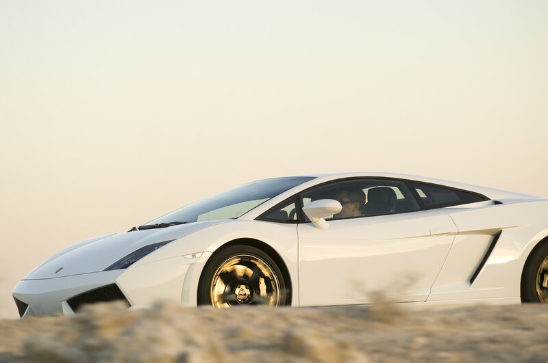 White sports car on desert