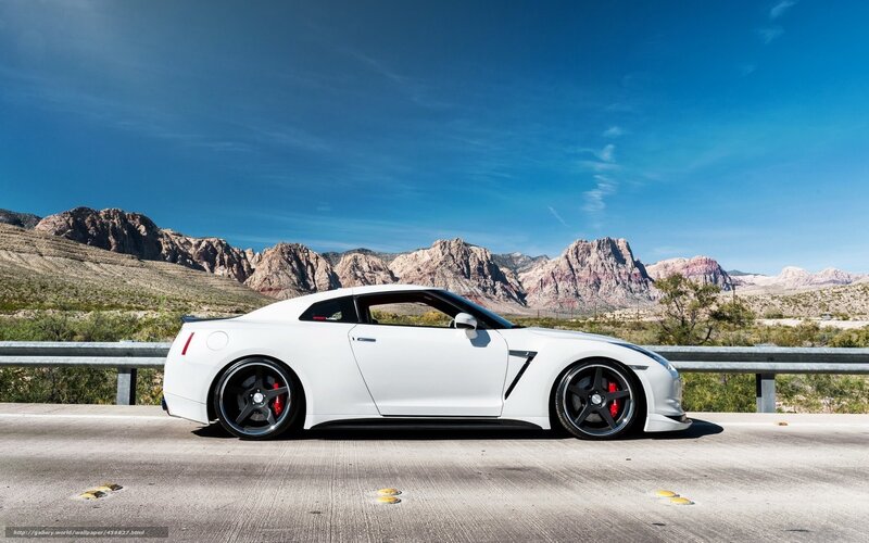 White sports car on desert road
