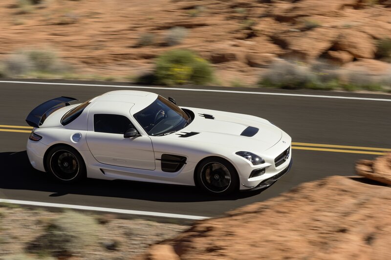 White sports car on desert road