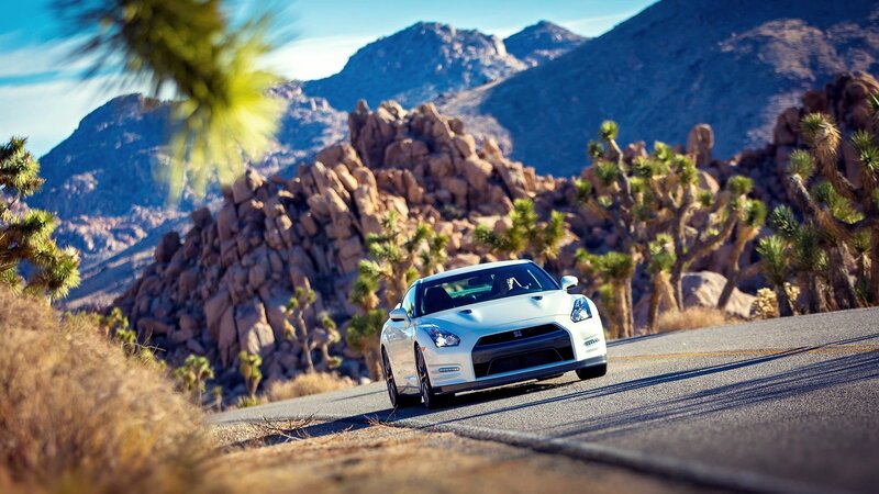 White sports car on desert road