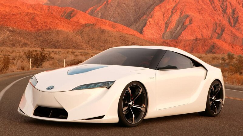White sports car on desert road